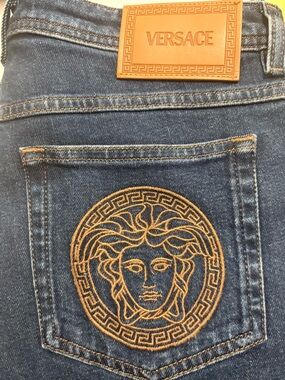 Versace Women’s Dark Blue Denim Jeans with Gold Medusa Embroidery